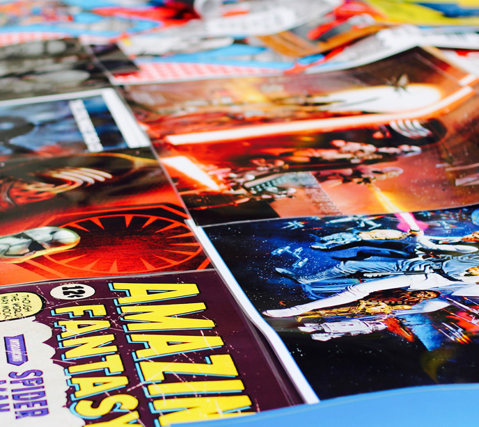 A close-up shot of two rows of star wars comic books.